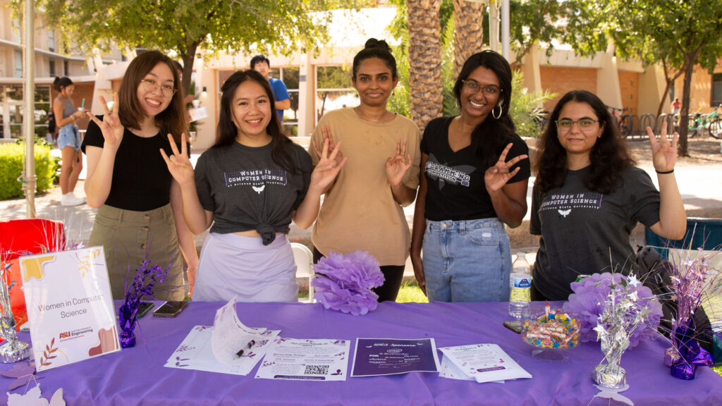 A group of students pose at a Fulton Schools student organization event.