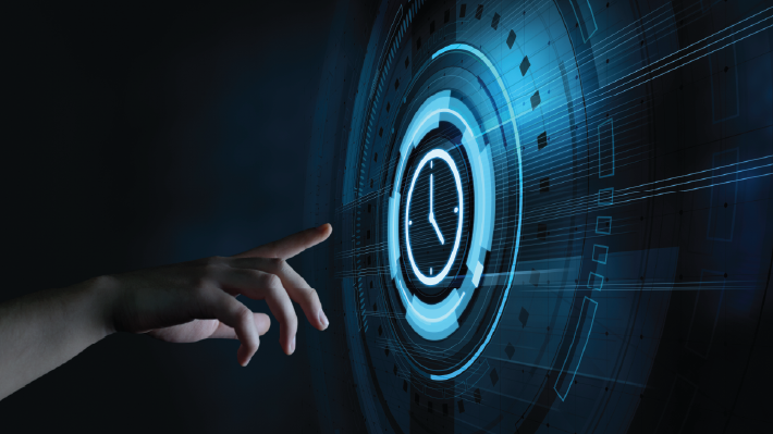 hand touching a large digital display